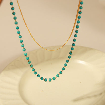 Collier double couche en acier titane turquoise