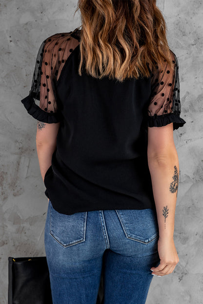 Schwarze kurzärmlige Bluse mit gepunktetem Mesh-Patchwork