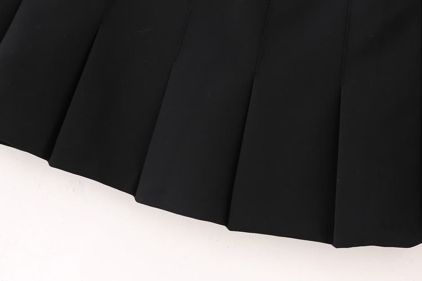 Jupe plissée noire fine taille haute pour femme