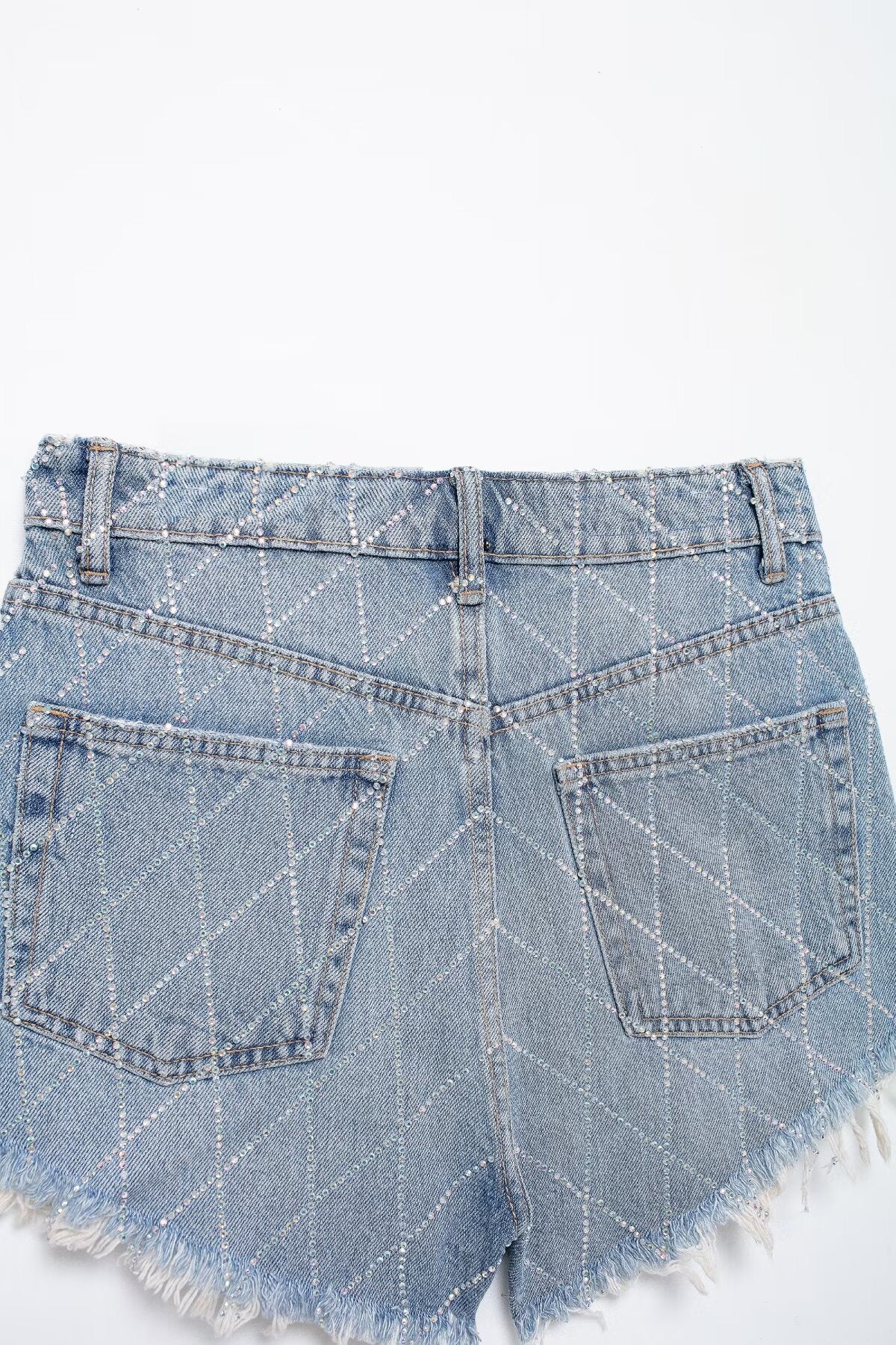 Short en jean taille haute à bords incurvés pour femme